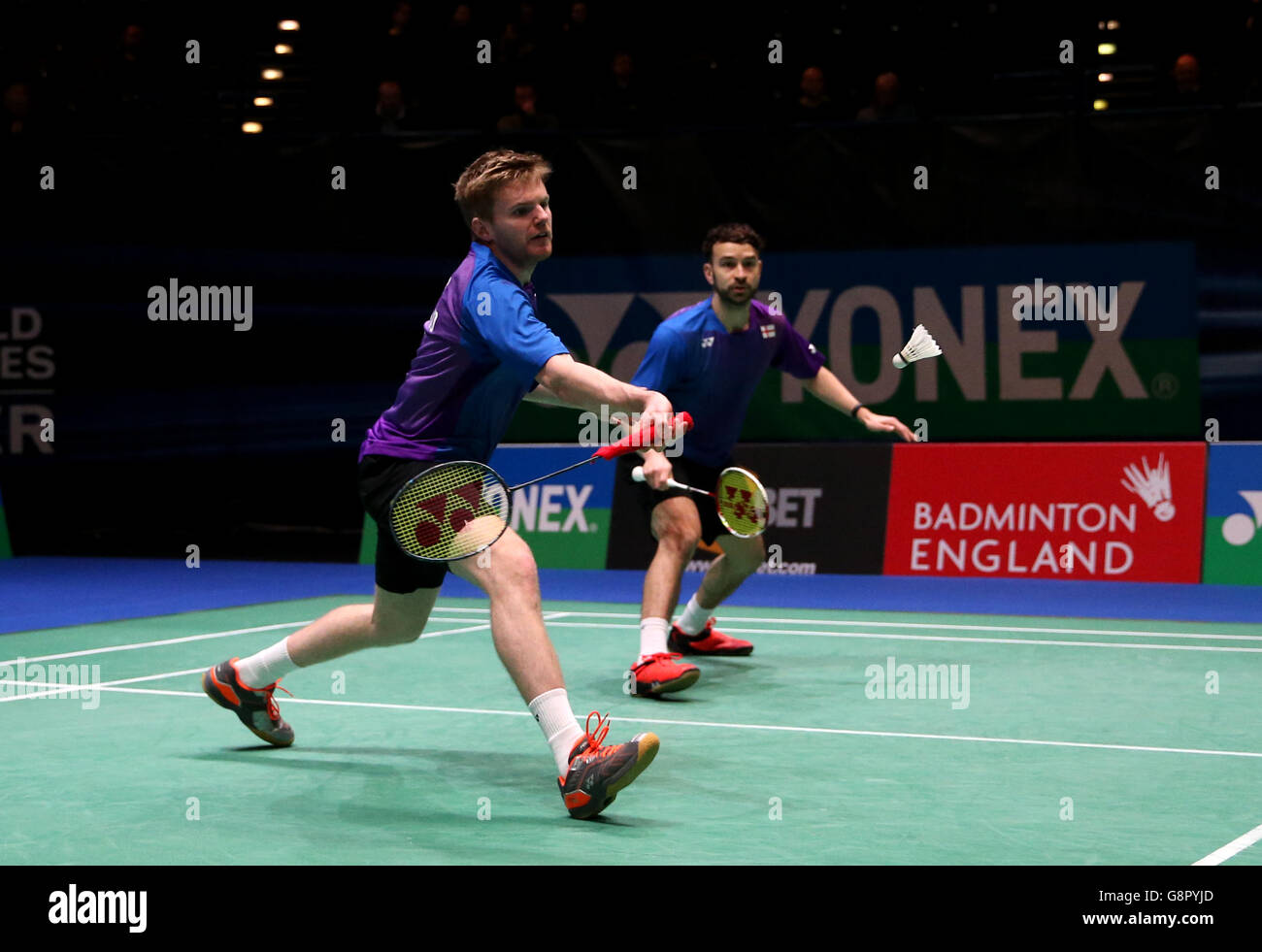 Marcus Ellis (left) and Chris Langridge in action during their men's doubles match during day one of the YONEX All England Open Badminton Championships at the Barclaycard Arena, Birmingham. Stock Photo