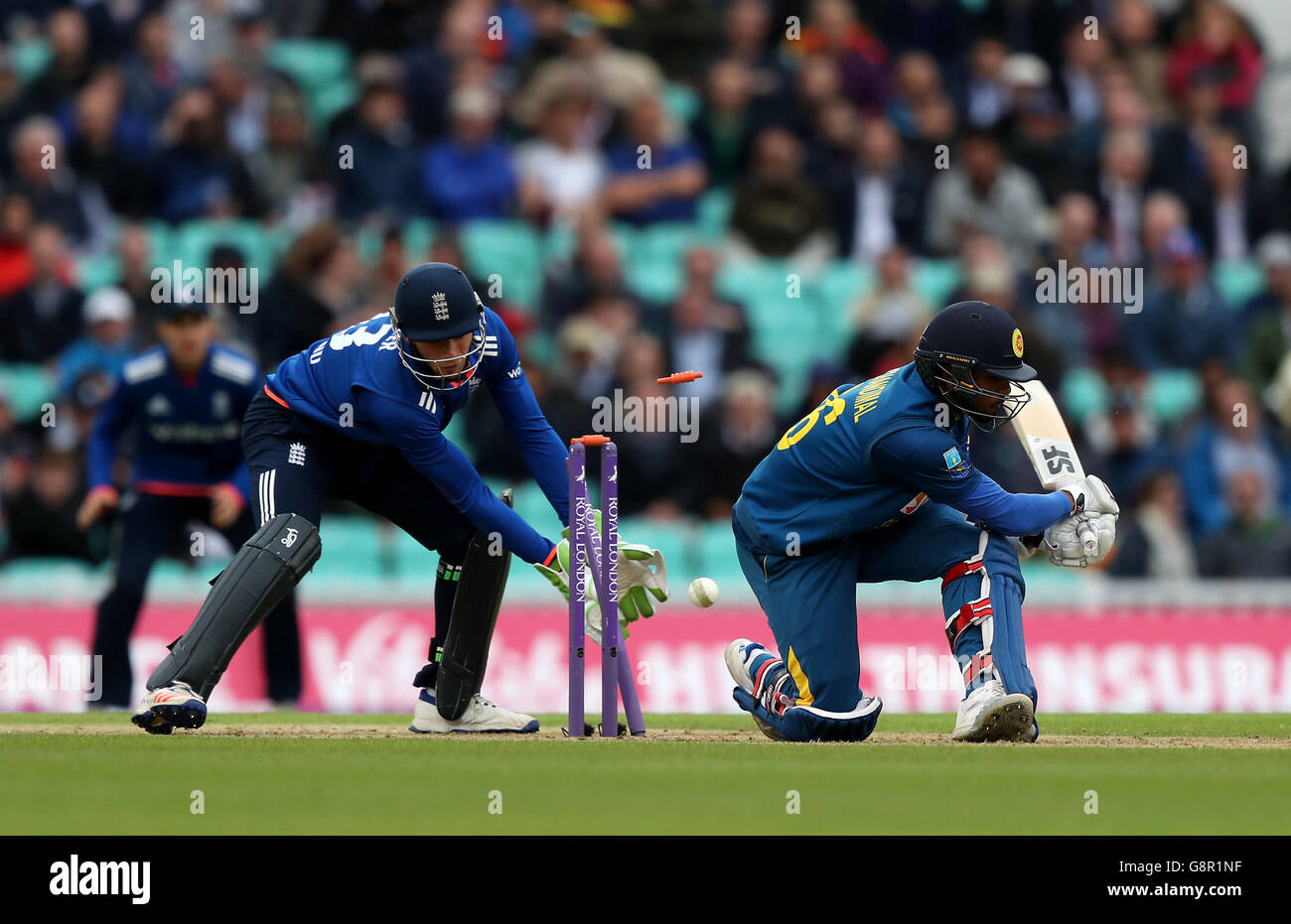 Sri Lanka's Dinesh Chandimal is bowled out by England's David Willey during the Royal London One Day International Series at the Kia Oval, London. Stock Photo