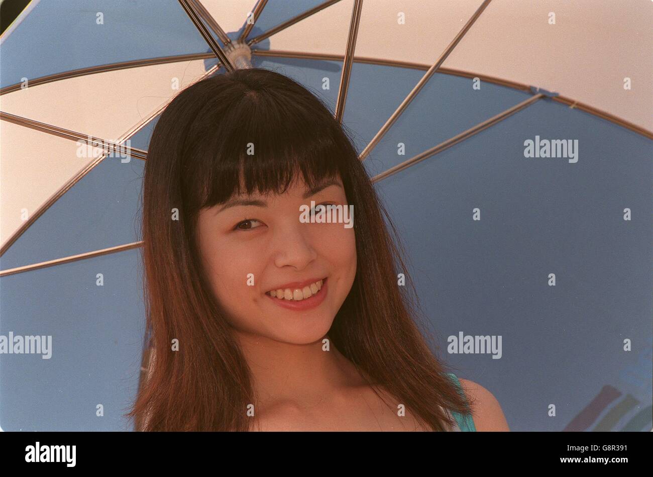 Formula One Motor Racing - Japanese Grand Prix. A Japanese model in the ...