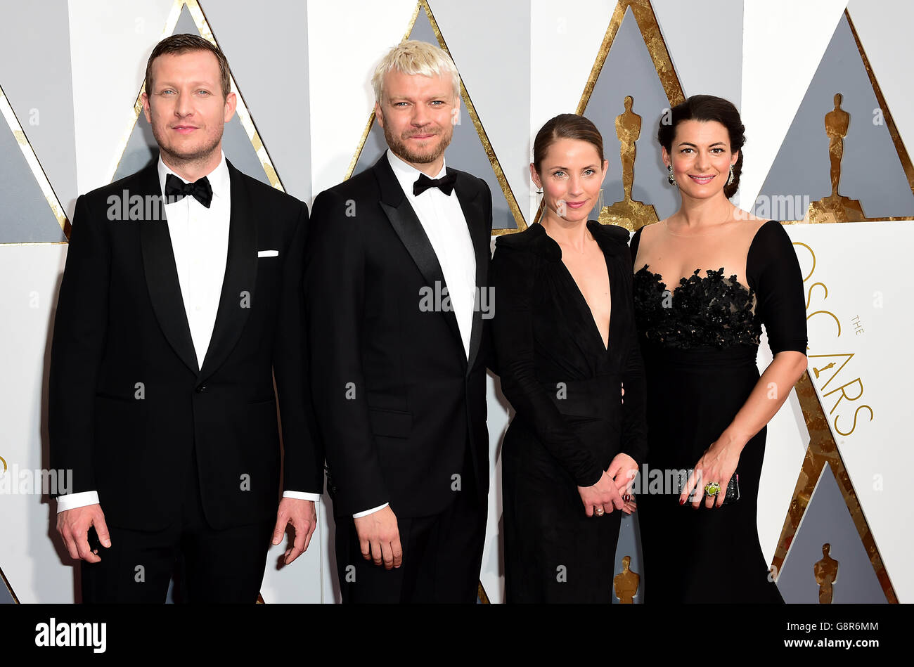 Tobias Lindholm, Pilou Asbaek, Tuva Novotny and Caroline Blanco arriving at the 88th Academy Awards held at the Dolby Theatre in Hollywood, Los Angeles, CA, USA, February 28, 2016. Stock Photo