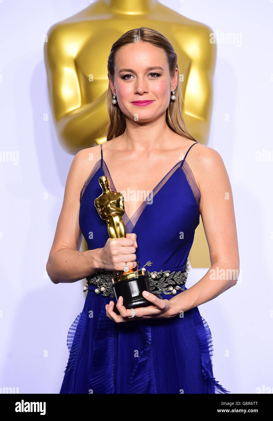 Brie Larson with the Academy Award for Best Actress in the press room