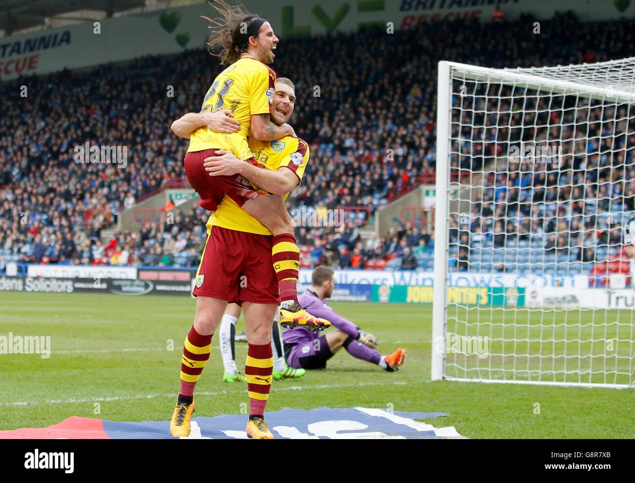 Burnley's Sam Vokes (right) celebrates with George Boyd after scoring his side's second goal of the game during the Sky Bet Championship match at the John Smith's Stadium, Huddersfield. Stock Photo