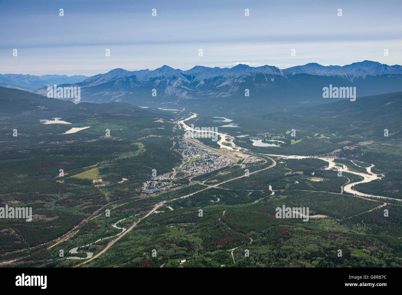 Aerial view from the summit of The Whistlers over the town Jasper, commercial centre of Jasper National Park, Alberta, Canada Stock Photo