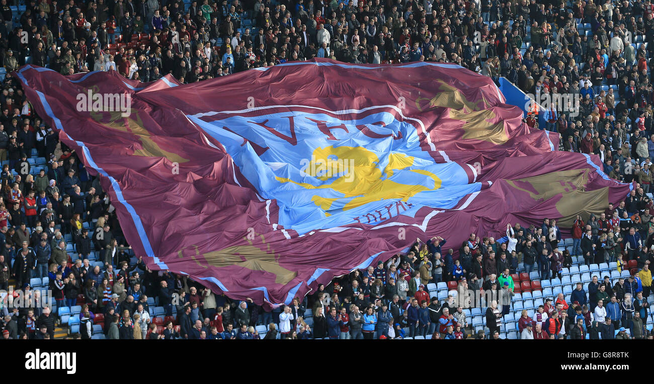 Aston Villa v Tottenham Hotspur - Barclays Premier League - Vila Park. Aston Villa fans pass the club flag over the Holte End before kick-off Stock Photo