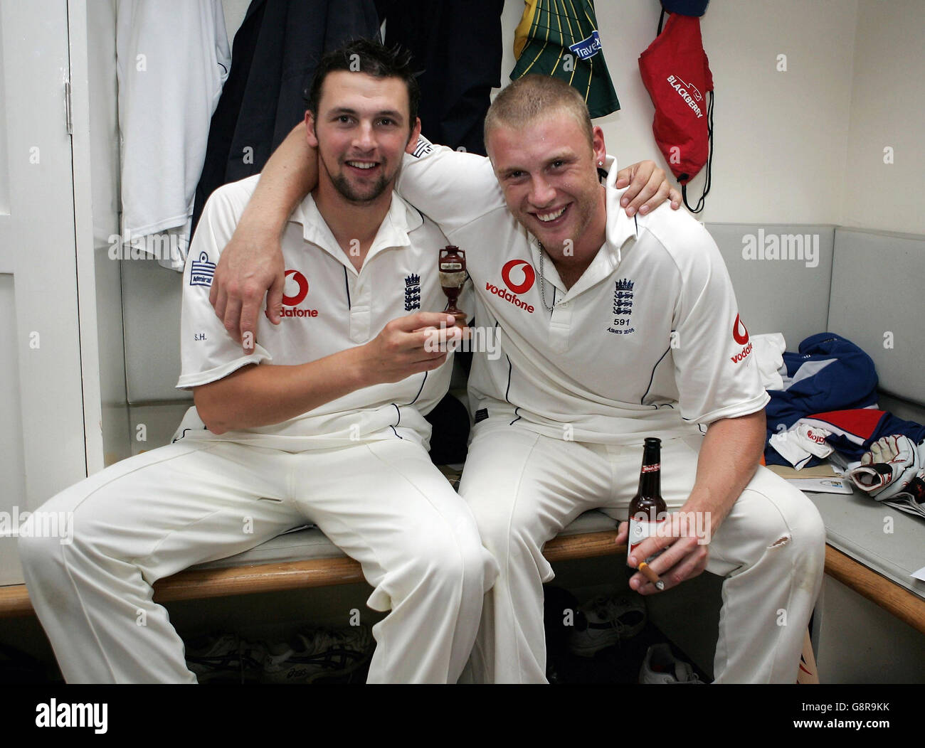 England's Steve Harmison (L) and Andrew Flintoff celebrate with the Ashes urn in the changing room after winning the Ashes on the final day of the fifth npower Test match against Australia at the Brit Oval, London, Monday September 12, 2005. England regained the Ashes after drawing the final Test match and winning the series 2-1. PRESS ASSOCIATION Photo. Photo credit should read: Tom Shaw/Getty Images/PA/POOL Stock Photo