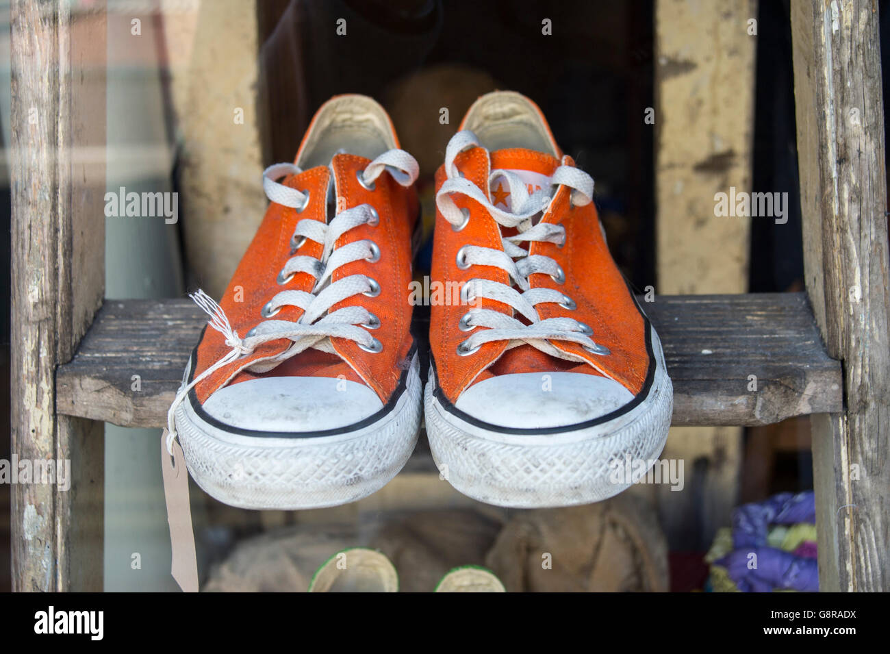 pair of orange converse trainers Stock Photo