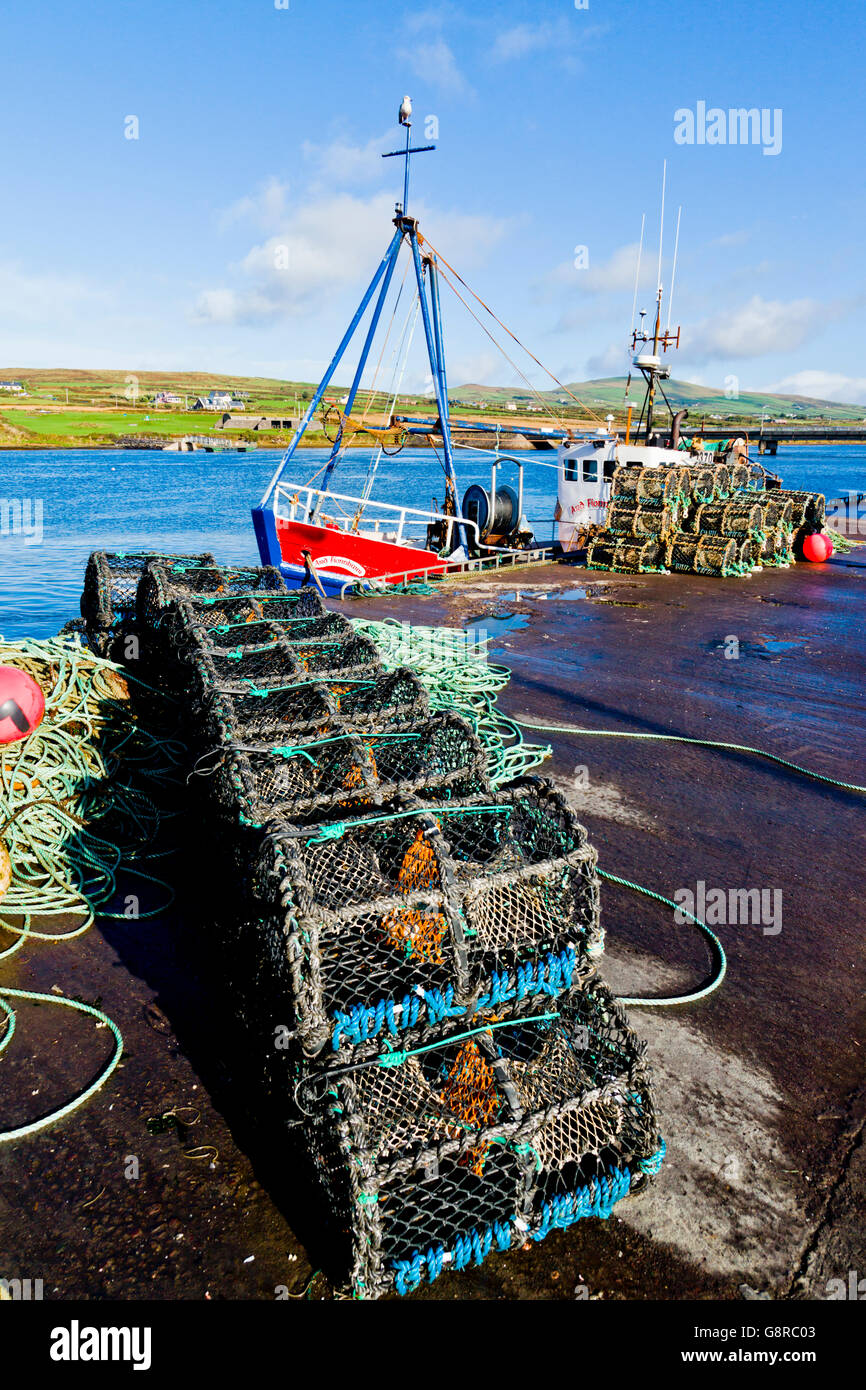 The lobster pots stacked on the pier of Portmagee in County Kerry