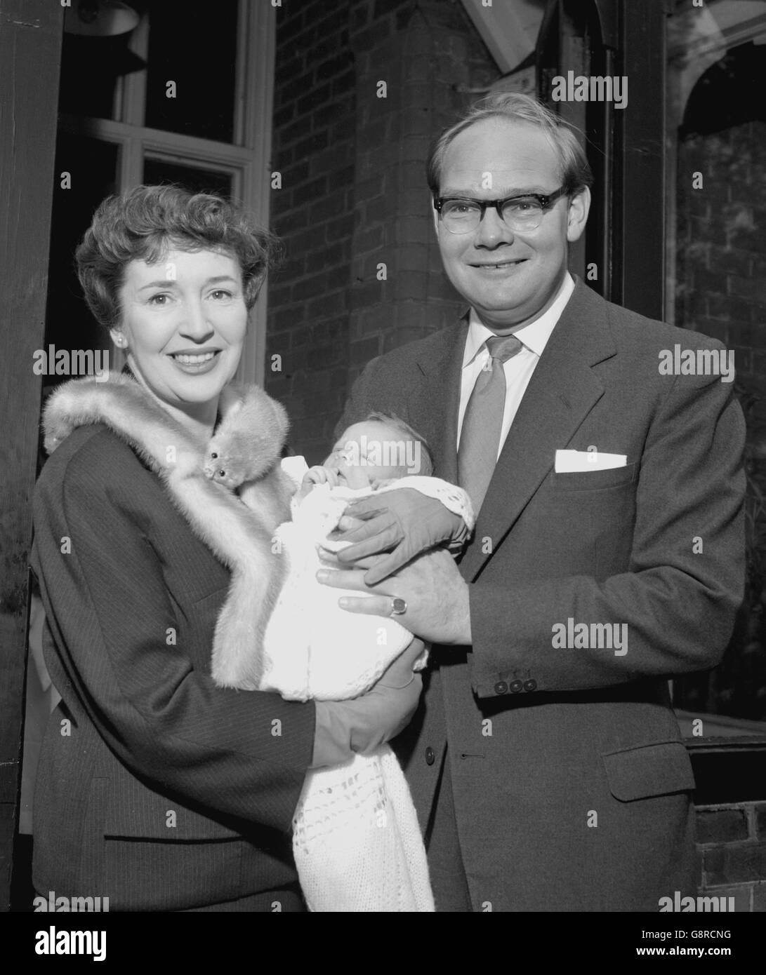 Radio and television stars Jean Metcalfe and Cliff Michelmore with their  baby son, Guy, pictured as Jean leaves the nursing home in Reigate, Surrey  Stock Photo - Alamy