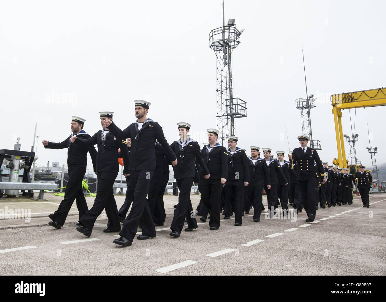Submariners during the commissioning ceremony at Faslane naval base on the Clyde when the 7,400-tonne nuclear-powered submarine HMS Artful officially joined the Royal Navy fleet. Stock Photo