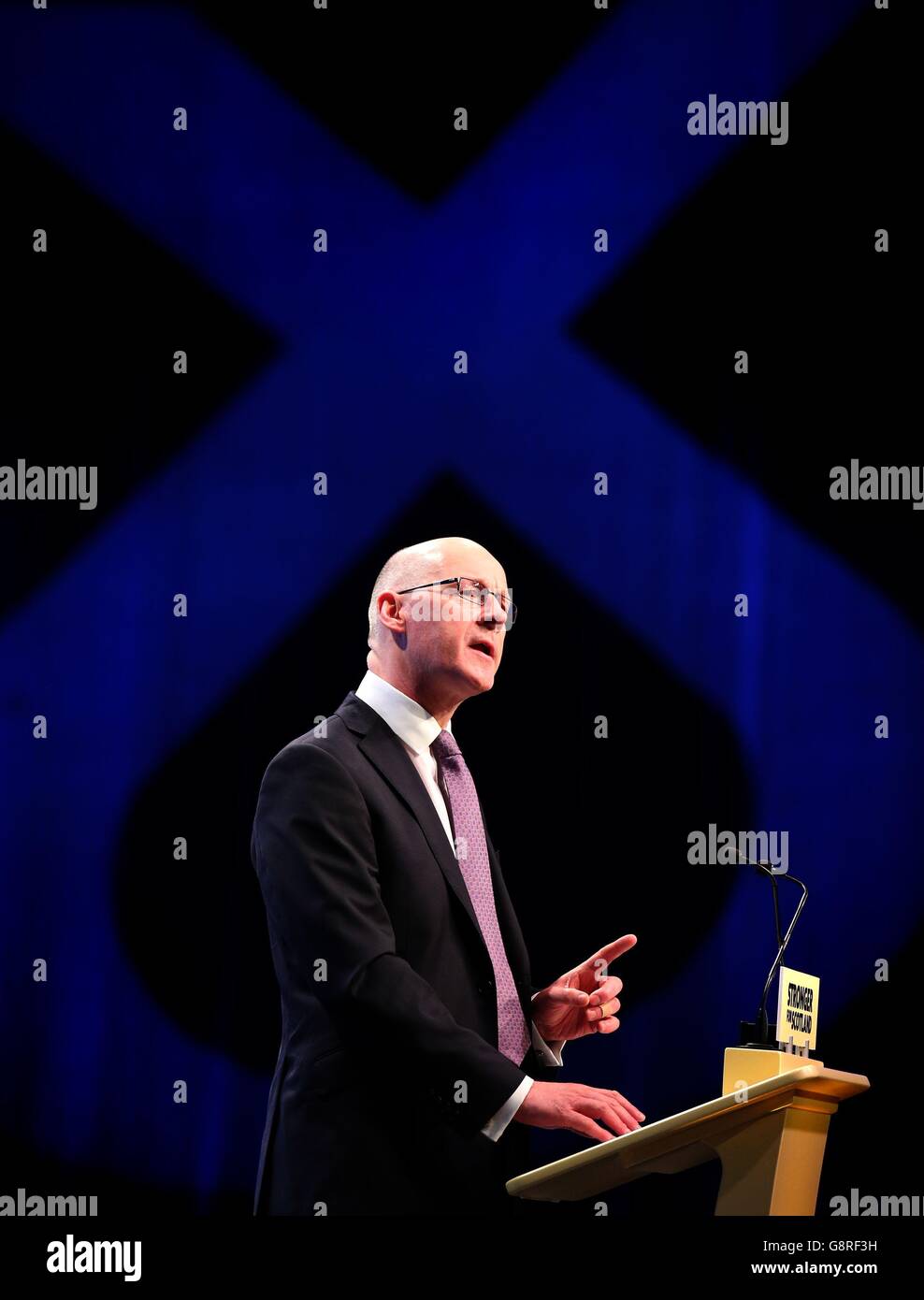 Deputy First Minister John Swinney speaking at the SNP spring conference at the SECC in Glasgow. Stock Photo