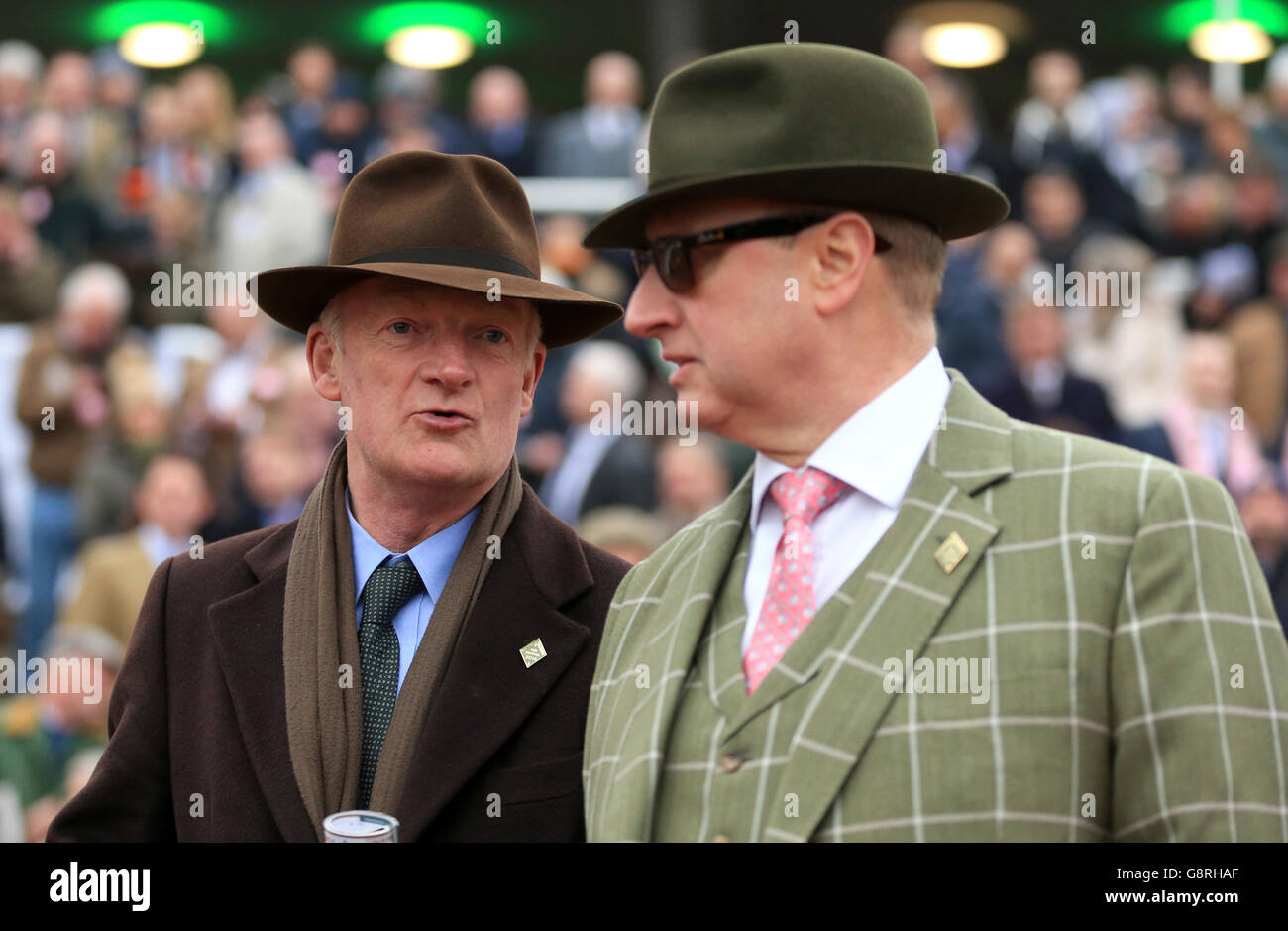 Trainer Willie Mullins (left) and owner Rich Ricci during Champion Day of the 2016 Cheltenham Festival at Cheltenham Racecourse. PRESS ASSOCIATION Photo. Picture date: Tuesday March 15, 2016. See PA story RACING Cheltenham. Photo credit should read: Mike Egerton/PA Wire. Stock Photo