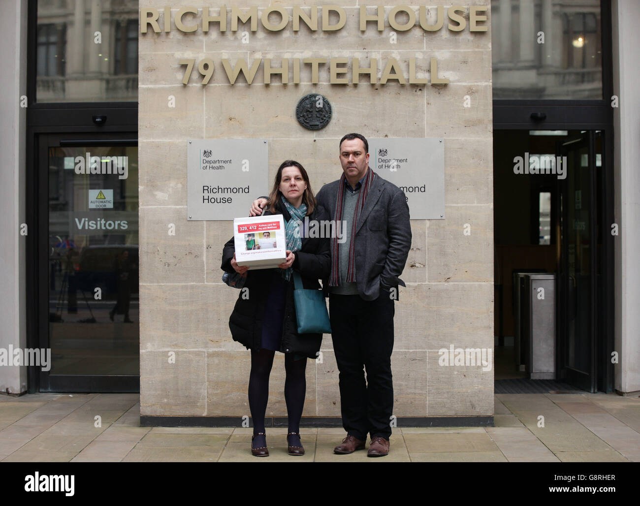 Isabelle and Robin Garnett, the parents of autistic teenager Matthew Garnett, outside the Department of Health in Whitehall, London, ahead of their meeting with health minister Alistair Burt to present a petition backed by more than 300,000 people demanding support for their son who has endured a six-month 'jail sentence' in a psychiatric ward. Stock Photo