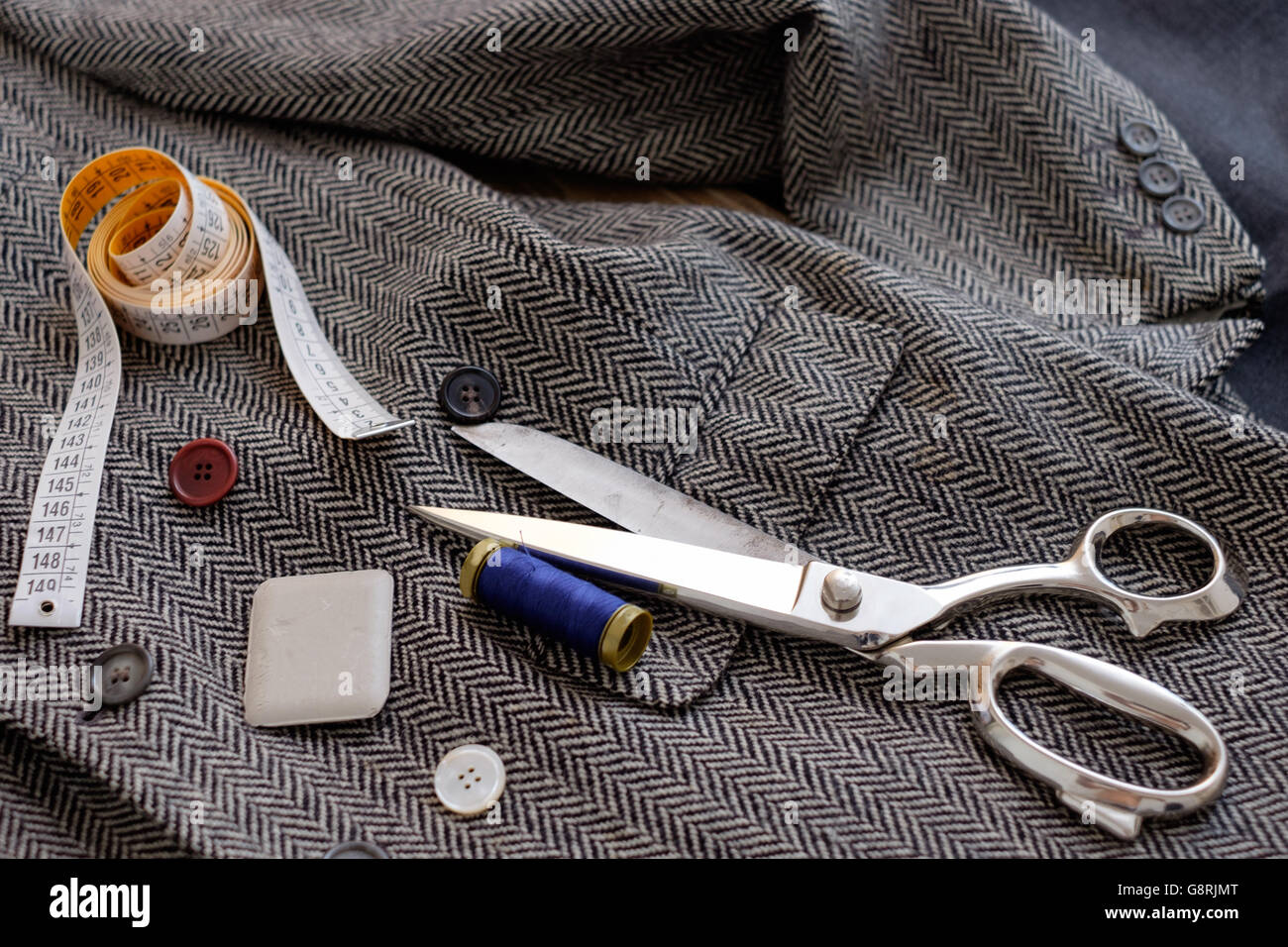 Collection of tailor tools on vintage classic jacket Stock Photo Alamy