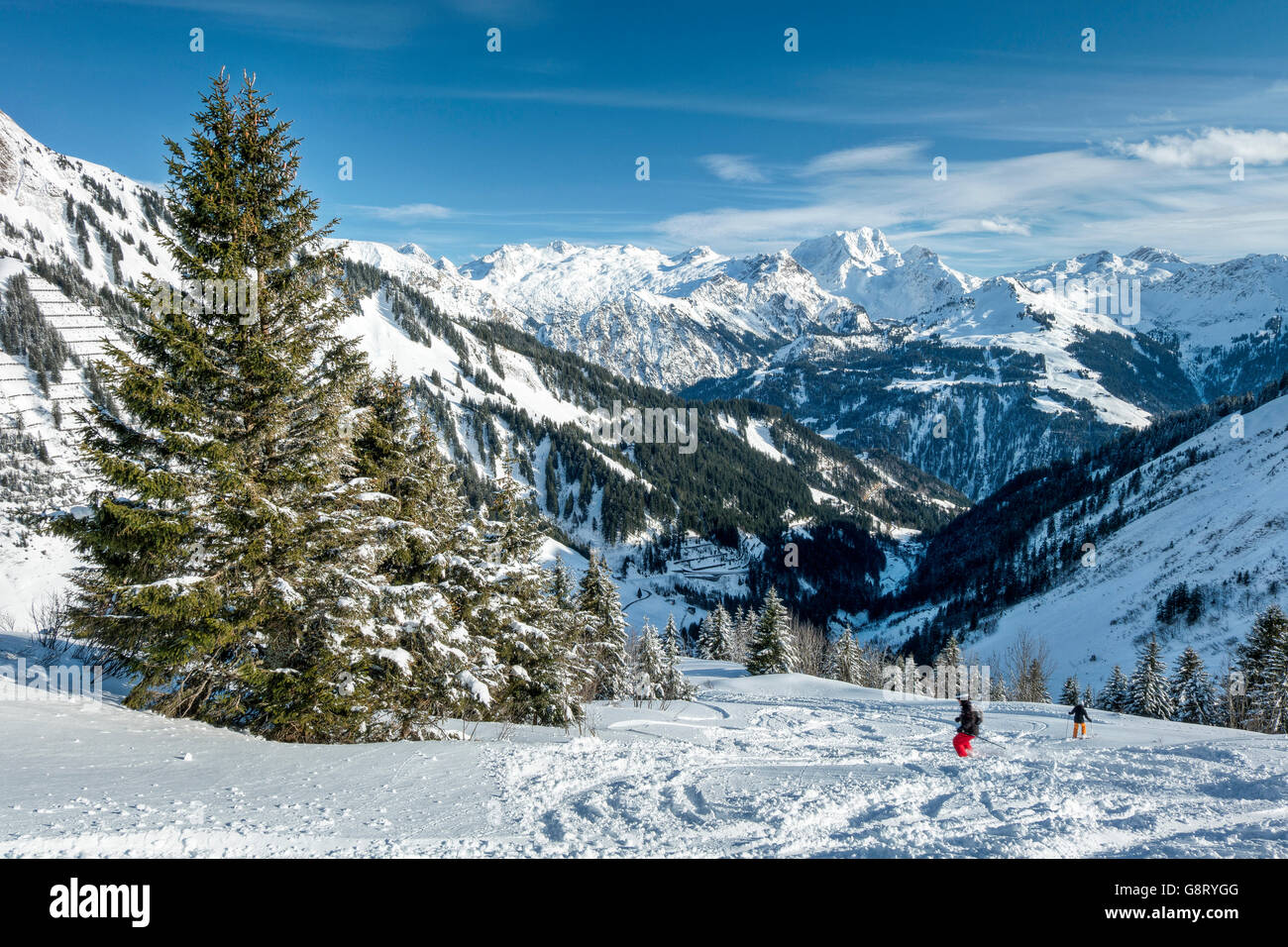 Austria, Biosphere Park Grosses Walsertal, Lechquellen Mountains, the valley and the North Tyrol Limestone Alps with the Rote Wand peak (2.704 m)from Mt. Hahnenkopfle (1780 m) Stock Photo