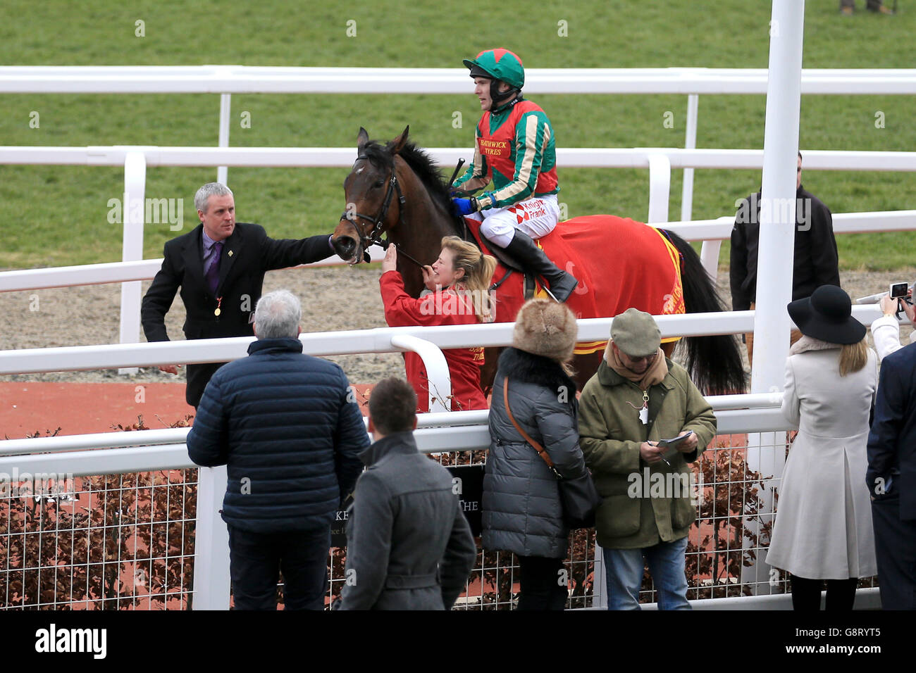 Jockey Tom Scudamore celebrates on board Un Temps Pour Tout after victory in the Ultima Handicap Chase during Champion Day of the 2016 Cheltenham Festival at Cheltenham Racecourse. Stock Photo
