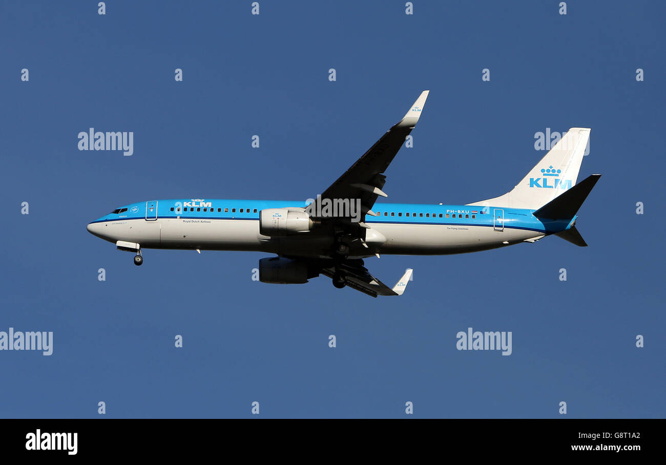 A KLM Royal Dutch Airlines Boeing 737-8BK(WL) plane with the registration PH-BXU lands at Heathrow Stock Photo