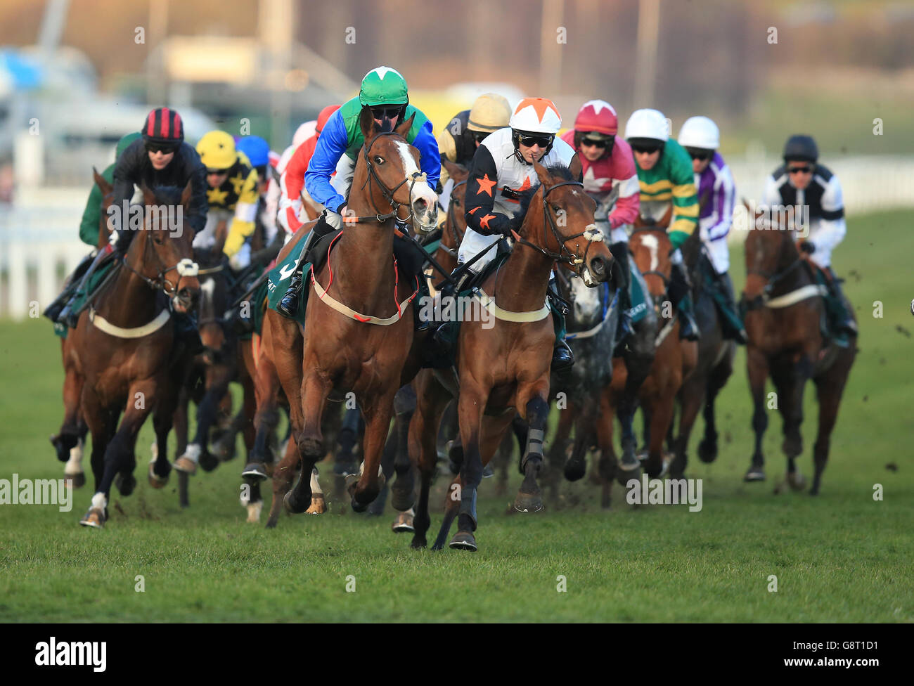 Winsome Bucks ridden by D L Queally (left) and Spirit Of Kayf ridden by Danny Cook in action during the Weatherbys Champion Bumper during Ladies Day of the 2016 Cheltenham Festival at Cheltenham Racecourse. Stock Photo