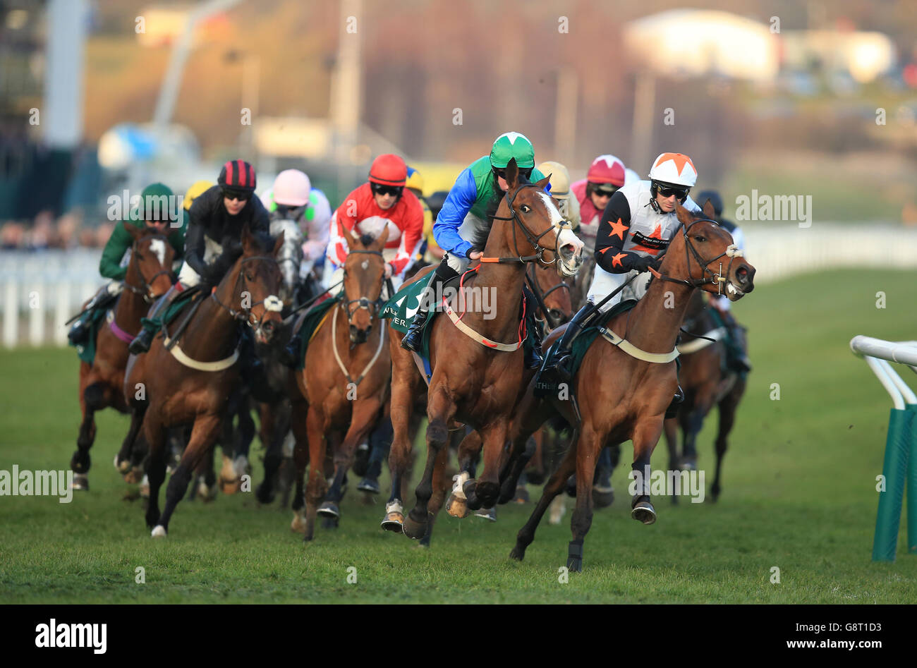 Winsome Bucks ridden by D L Queally (centre) and Spirit Of Kayf ridden by Danny Cook (right) in action during the Weatherbys Champion Bumper during Ladies Day of the 2016 Cheltenham Festival at Cheltenham Racecourse. Stock Photo