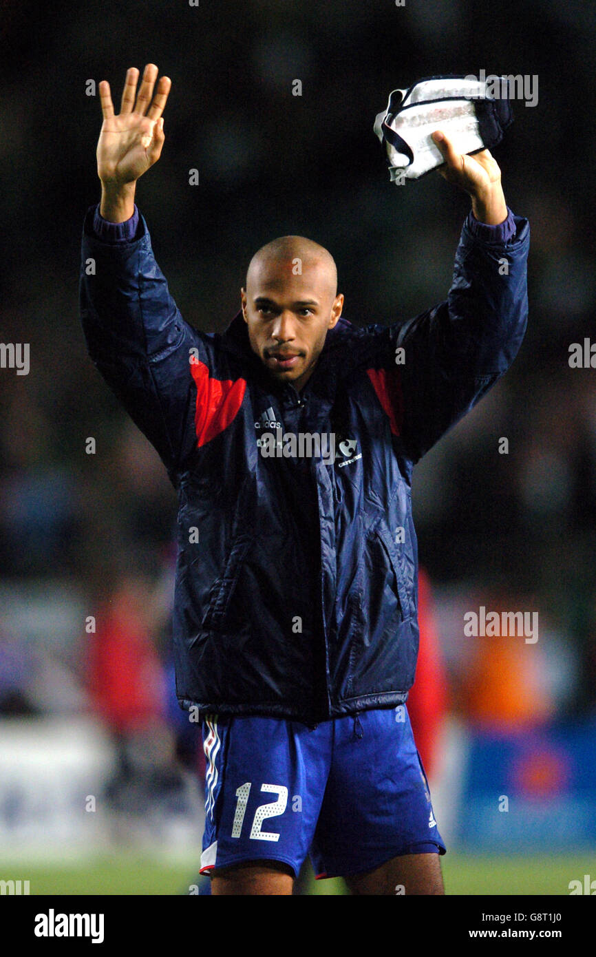 France's Thierry Henry applauds the travelling fans at the end of the game Stock Photo