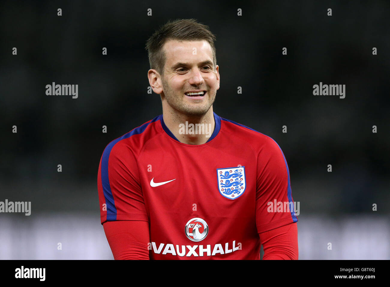 England goalkeeper Tom Heaton is all smiles during the warm-up before the International Friendly match at the Olympic Stadium, Berlin. Stock Photo
