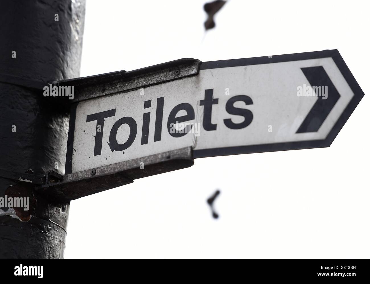 A sign for public toilets in London. Spending by councils in England on