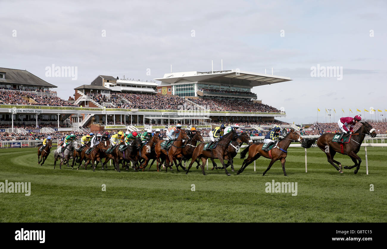 Runners and riders in the Alder Hey Children's Charity Handicap Hurdle during Ladies Day of the Crabbie's Grand National Festival at Aintree Racecourse, Liverpool. Stock Photo