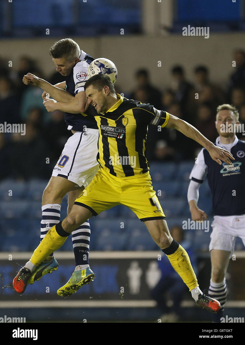 Millwall's Steve Morison and Burton Albion's John Mousinho battle for the  ball during the Sky Bet League One match at the New Den, London Stock Photo  - Alamy