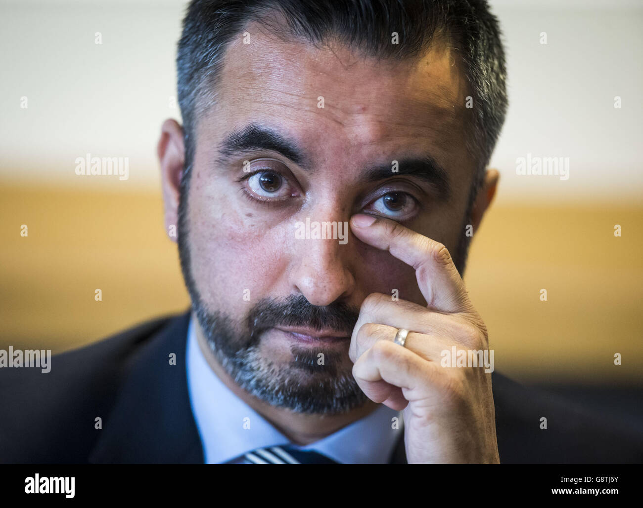 Lawyer Aamer Anwar during a press conference at Hampden Park in Glasgow to condemn the recent terror attacks around the world and death of shopkeeper Asad Shah in Glasgow. Stock Photo