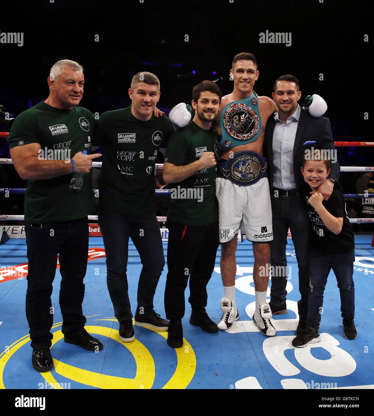 Callum Smith celebrates with brothers Liam (second left), Stephen (third  left) and Paul after beating Hadillah Mohoumadi in their Final Eliminator  for the WBC Super-Middleweight Championship & European Super-Middleweight  title bout at