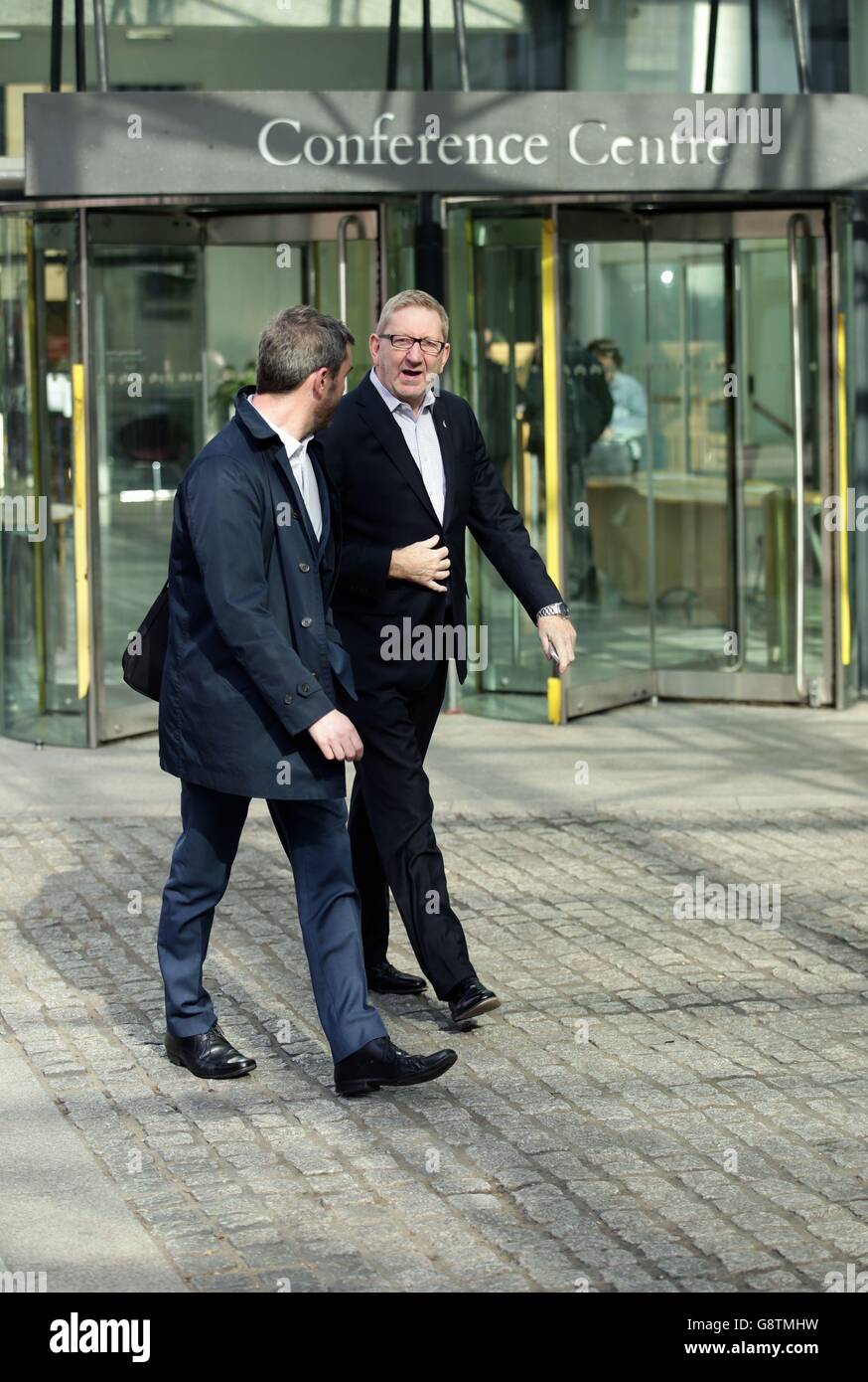 Unite General Secretary Len McCluskey (right) arrives at the Department for Business, Innovation & Skills in London for talks with the Government, as workers in the carmaking arm of Indian conglomerate Tata have urged the company to allow enough time to sell its UK steel business. Stock Photo