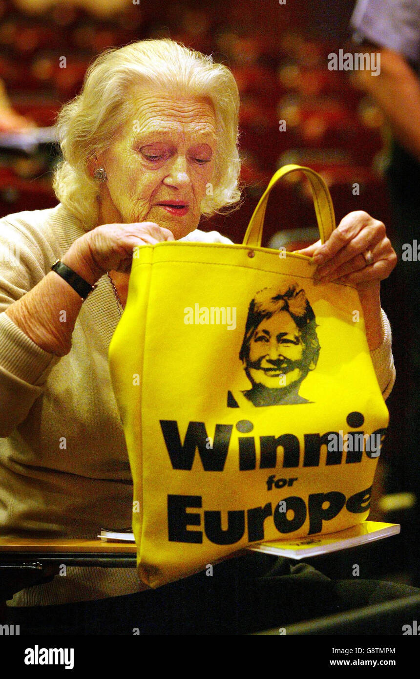 A Scottish National Party supporter looks in an old bag promoting Winnie Ewing, former MP who is stepping down as Party President, at the party conference in Aviemore, Wednesday September 21, 2005. Party leader Alex Salmond today set his party the target of winning 20 more first past the post seats at the next Holyrood election. See PA Story SCOTLAND SNP. PRESS ASSOCIATION Photo. Photo credit should read: David Cheskin/PA. Stock Photo