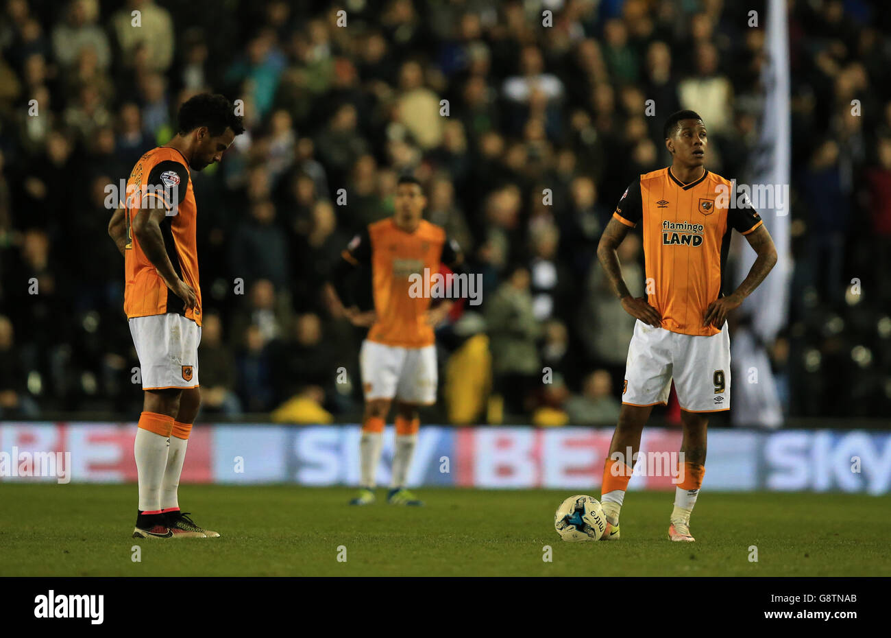 Hull City's Tom Huddlestone and Abel Hernandez stand dejected after Derby County score their third goal Stock Photo