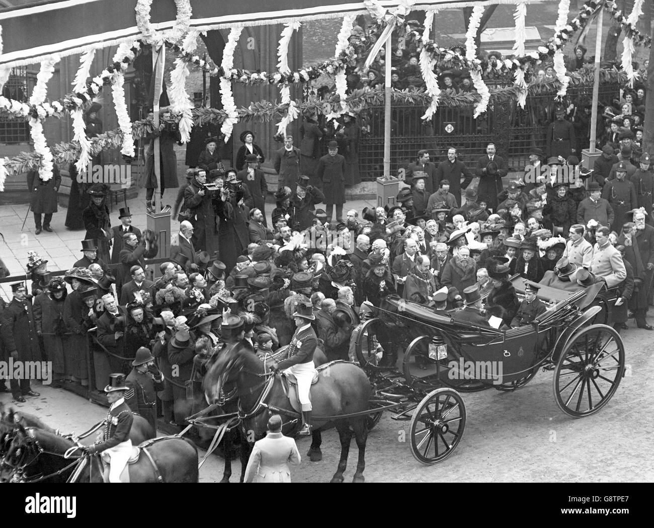 Queen Mary and the Prince of Wales drive through Kensington. Exact date unknown. Stock Photo