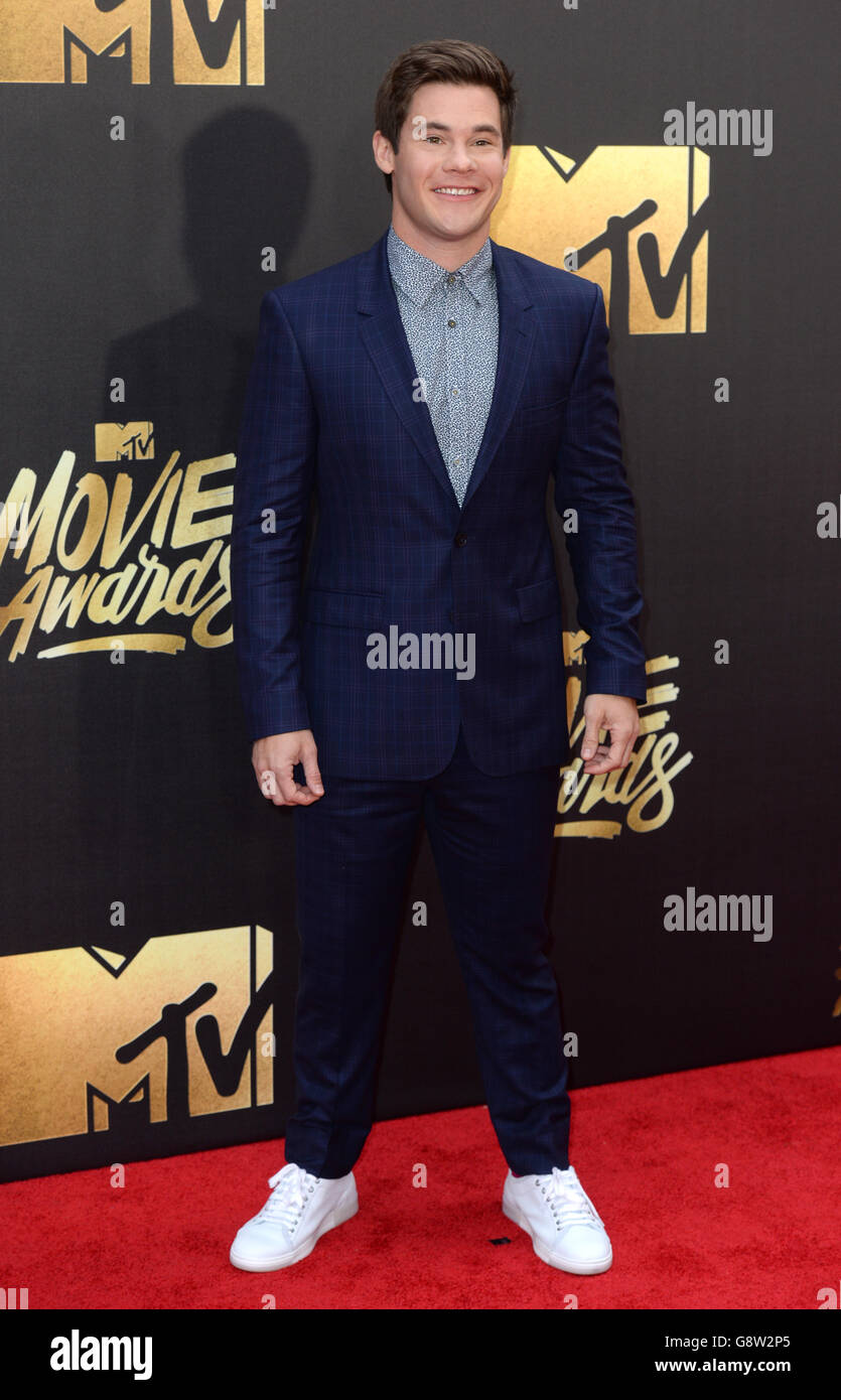 Adam DeVine arriving at the 2016 MTV Movie Awards at Warner Bros Studios in Burbank, Los Angeles. Stock Photo