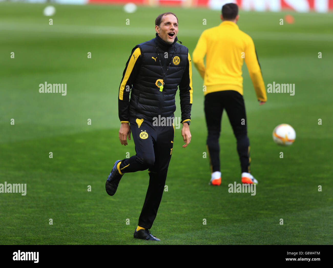 Borussia Dortmund head coach Thomas Tuchel shares a joke with his coaching staff during a training session at Anfield, Liverpool. Stock Photo