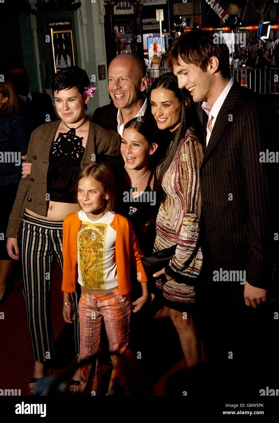 Library filer dated 18-06-2003 of Demi Moore (2nd Right) with her ex-husband Bruce Willis (2nd left) and their children Rumer (left), Scout and Tallulah (front centre) and actor Ashton Kutcher (right). Demi Moore and her toyboy lover Ashton Kutcher have tied the knot, according to two celebrity magazines, Monday 26 September, 2005. The couple married on Saturday night at a Beverly Hills home in a ceremony attended by 100 of their closest friends and family, including Moore's ex-husband Bruce Willis, US Weekly and People reported on their websites. See PA Story SHOWBIZ Moore. PRESS ASSOCIATION Stock Photo