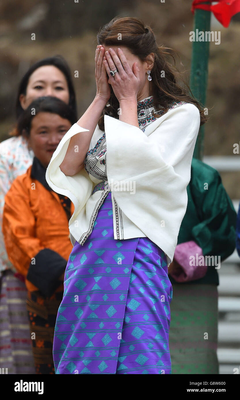 The Duchess of Cambridge reacts after throwing a dart at an archery event in Thimphu, Bhutan, during day five of the royal tour to India and Bhutan. Stock Photo