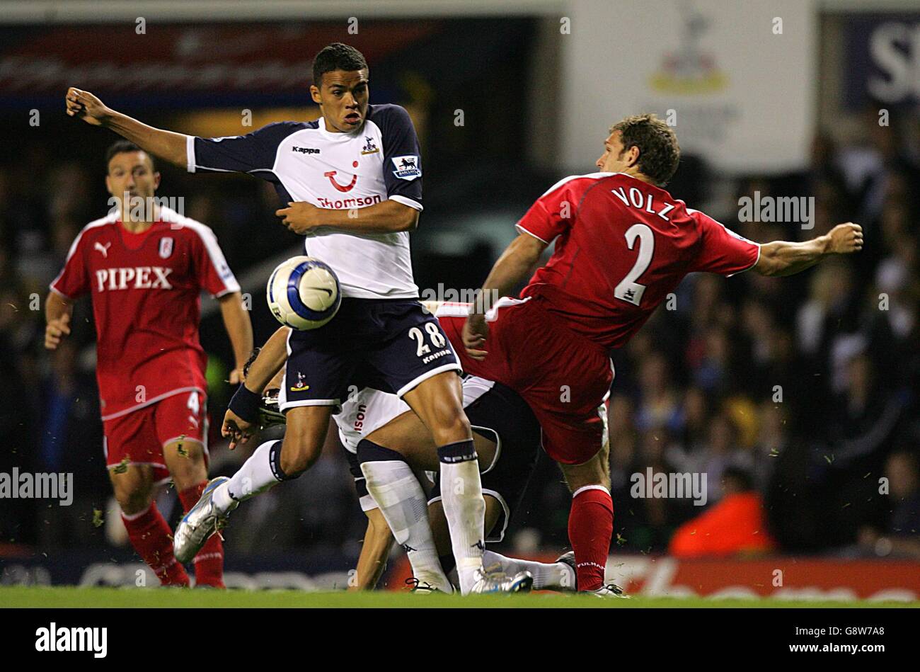 Soccer - FA Barclays Premiership - Tottenham Hotspur v Fulham - White Hart Lane. Tottenham Hotspur's Jermaine Jenas and Fulham's Moritz Volz (R) battle for the ball. Stock Photo