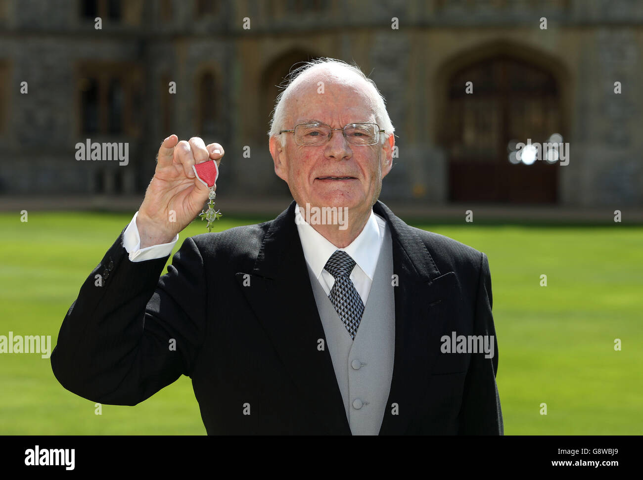 Ian Beattie from Bristol after receiving his Member of the Order of the British Empire (MBE) medal at an Investiture ceremony in Windsor Castle, Berkshire. Stock Photo