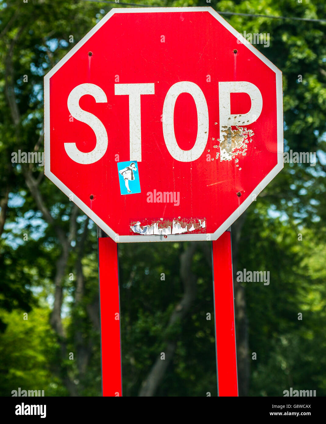 vandalized stop sign in Sag Harbor, NY Stock Photo