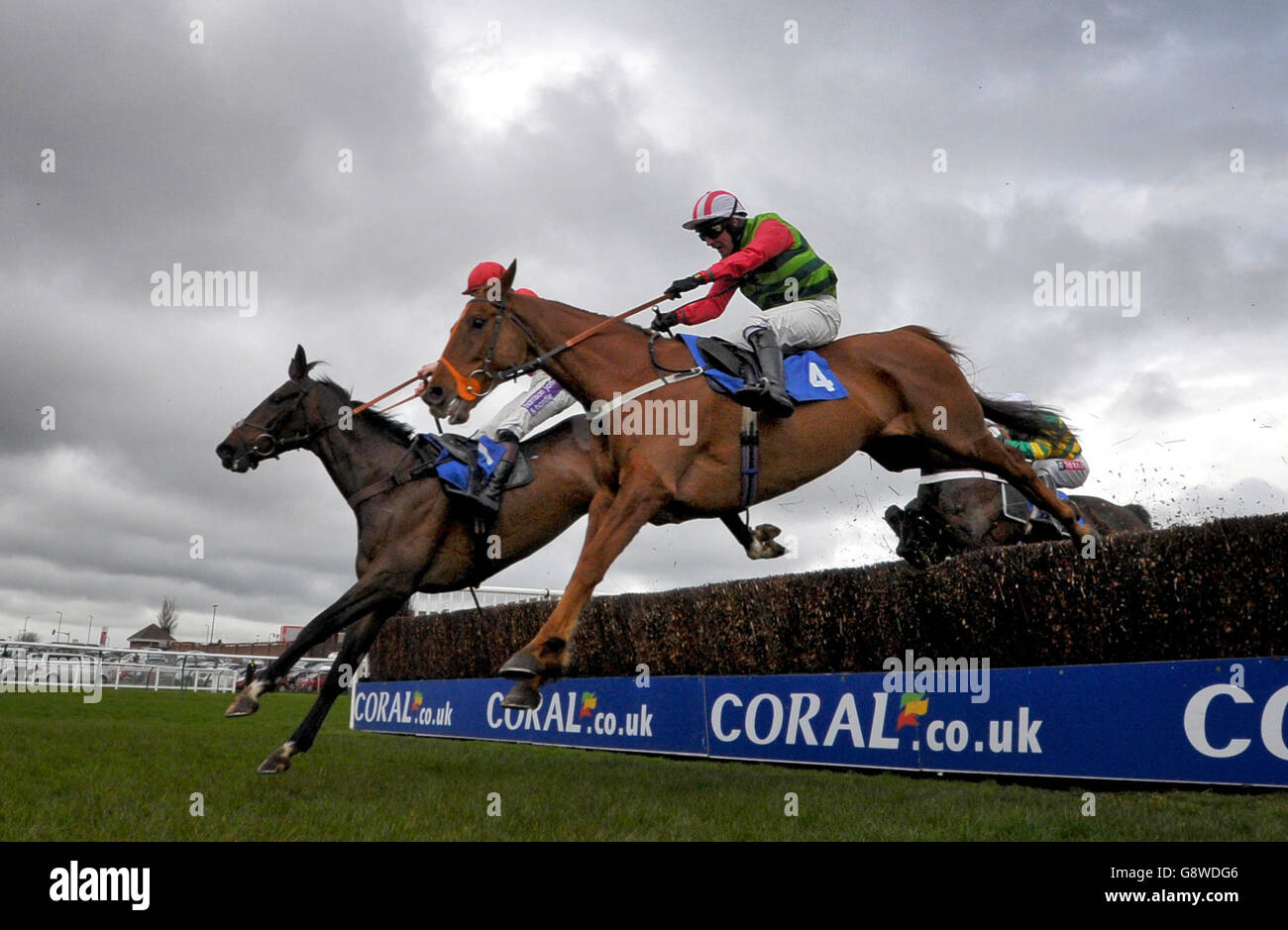 Definitely Red ridden by Danny Cook on his way to winning the Hillhouse Quarry Handicap Steeple Chase during Ladies Day of the Coral Scottish Grand National Festival at Ayr Racecourse. PRESS ASSOCIATION Photo. Picture date: Friday April 15, 2016. See PA story RACING Ayr. Photo credit should read: Jane Barlow/PA Wire Stock Photo