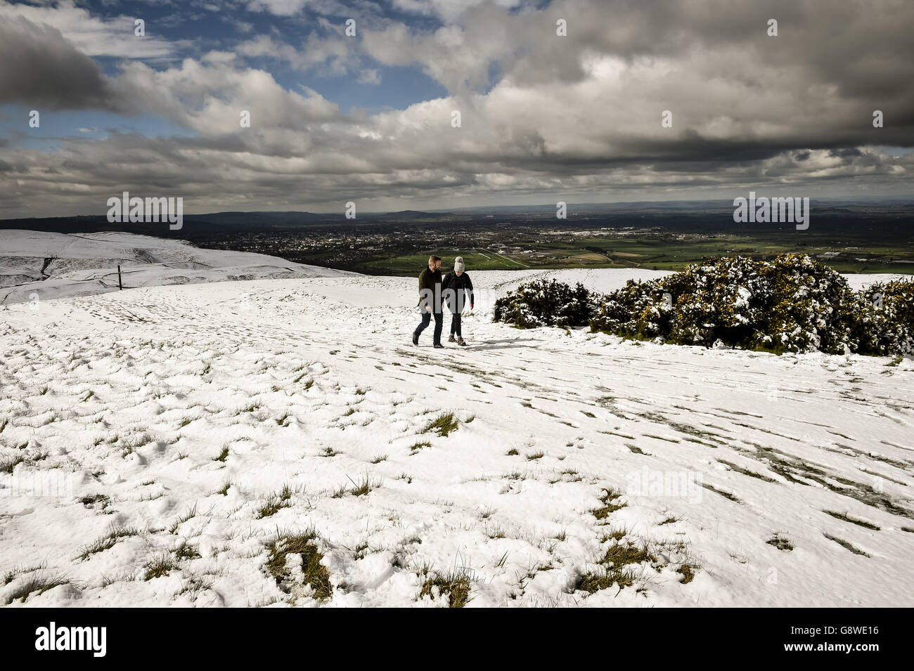 People enjoy walking on Cleeve Hill in Cheltenham, where a cold weather