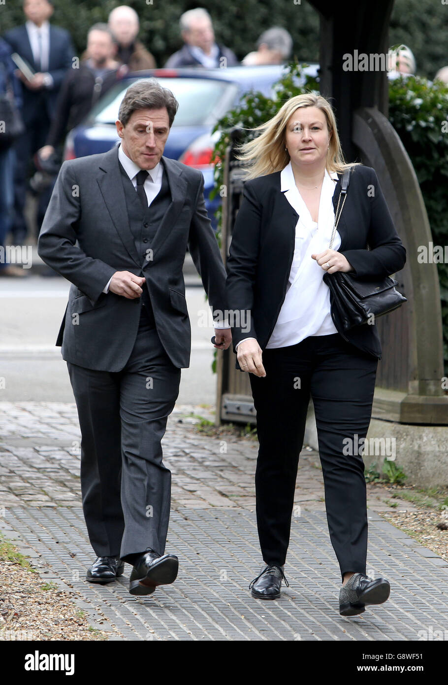 Rob Brydon arrives with his wife Claire Holland, for the funeral service of  Ronnie Corbett, at St John the Evangelist Church, near the late comedian's  home in Shirley, Croydon, south London Stock