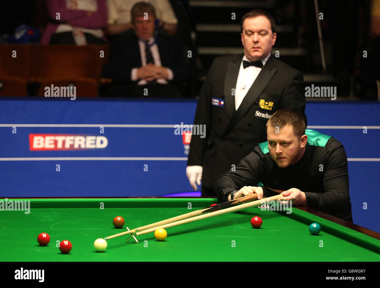 Mark Allen in action against Mitchell Mann during day five of the Betfred Snooker World Championships at the Crucible Theatre, Sheffield Stock Photo 