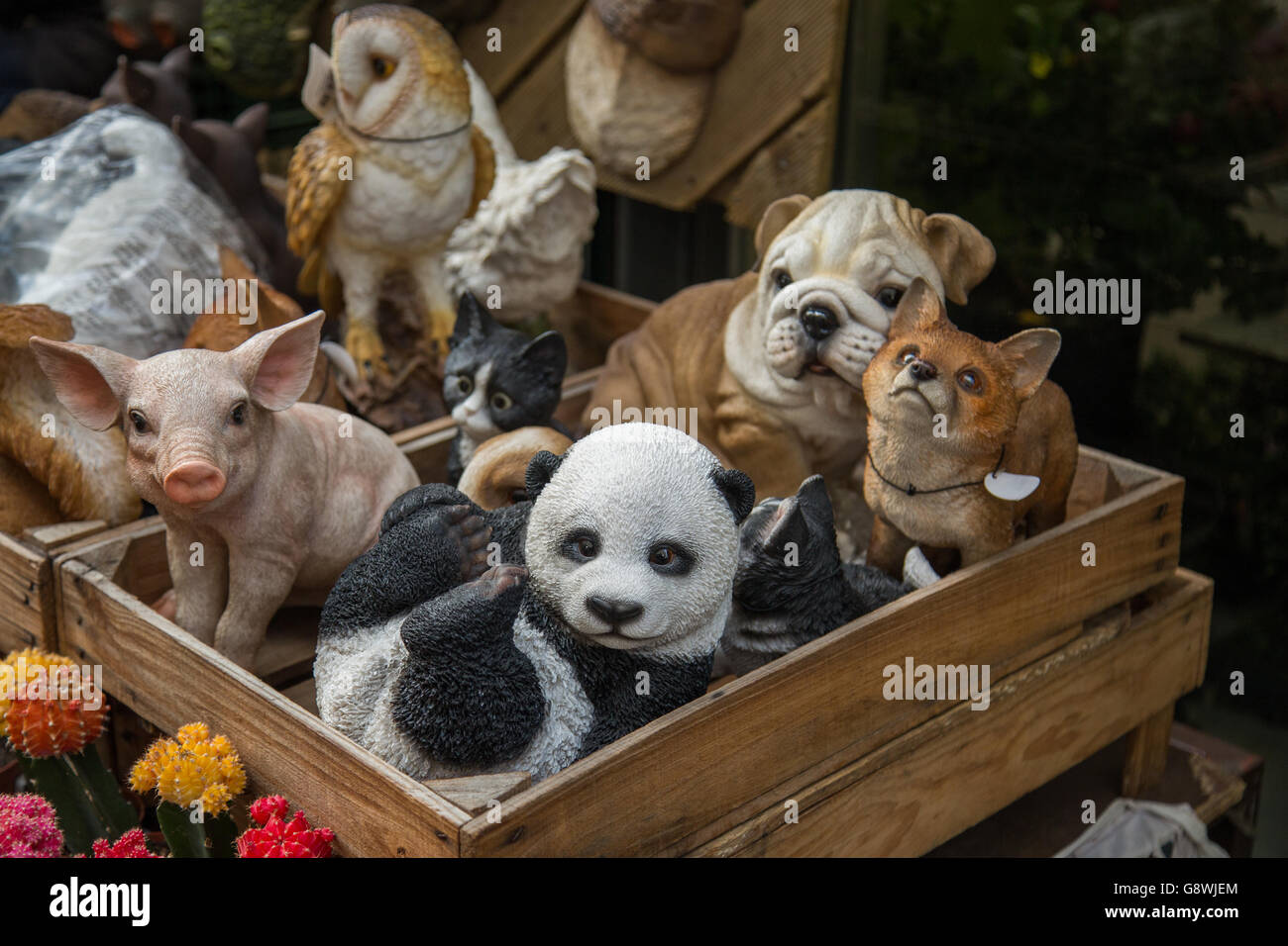A box of plastic animals on sale at a market in Amsterdam Stock Photo