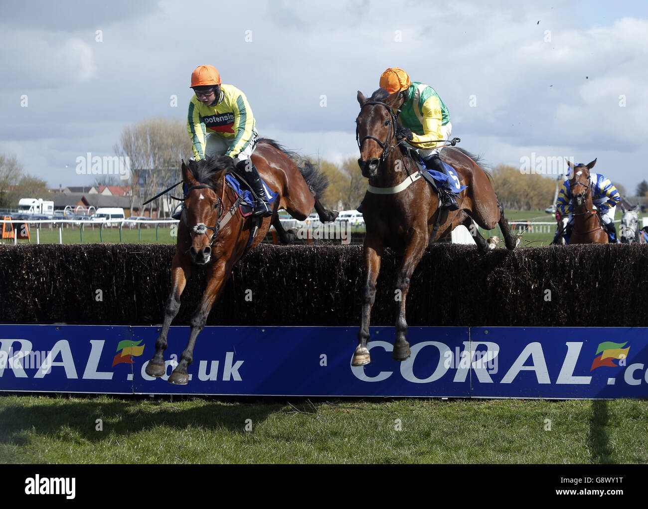 Jockey Sean Bowen (left) riding Vivaldi Collonges winner of the Weatherbys Private Bank Novices' Limited Handicap Steeple Chase (Class 2) during Scottish Grand National Day at the Coral Scottish Grand National Festival at Ayr Racecourse. Stock Photo