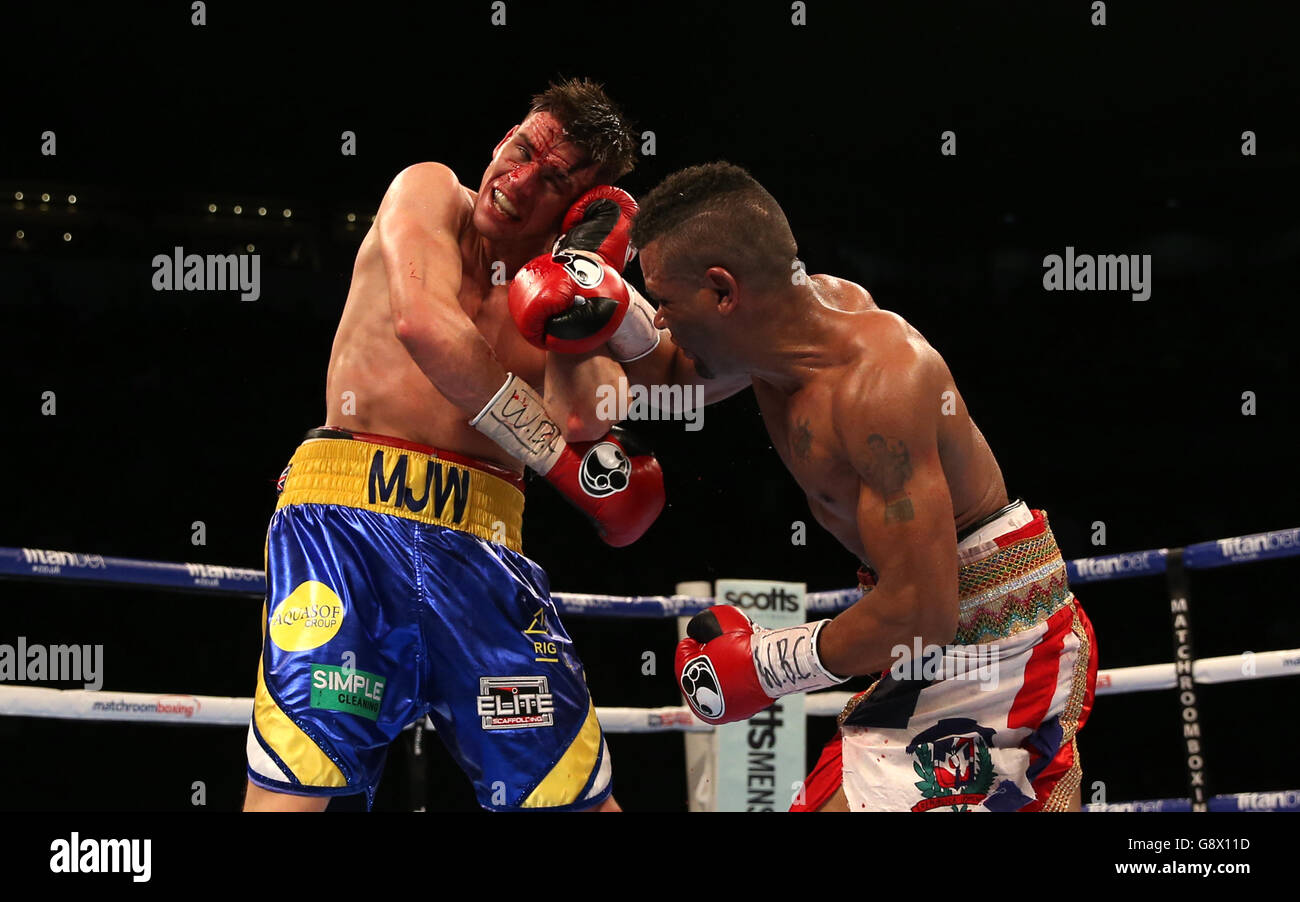 Martin Ward (left) in action against Ruddy Encarnacion during their WBC Intercontinental Super-Featherweight bout at the First Direct Arena, Leeds. Stock Photo