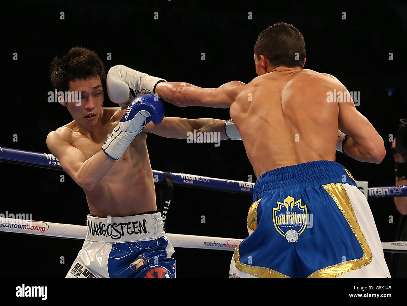 Josh Warrington and Hisashi Amagasa during the WBC International Featherweight Championship bout at the First Direct Arena, Leeds. Stock Photo