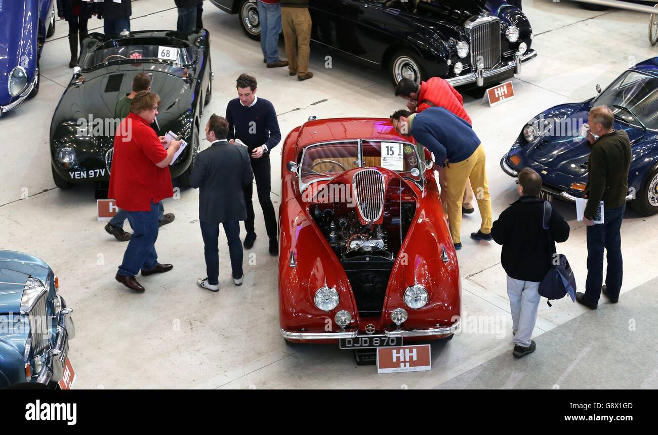 Members of the public view lots during the H&H classic car auction at