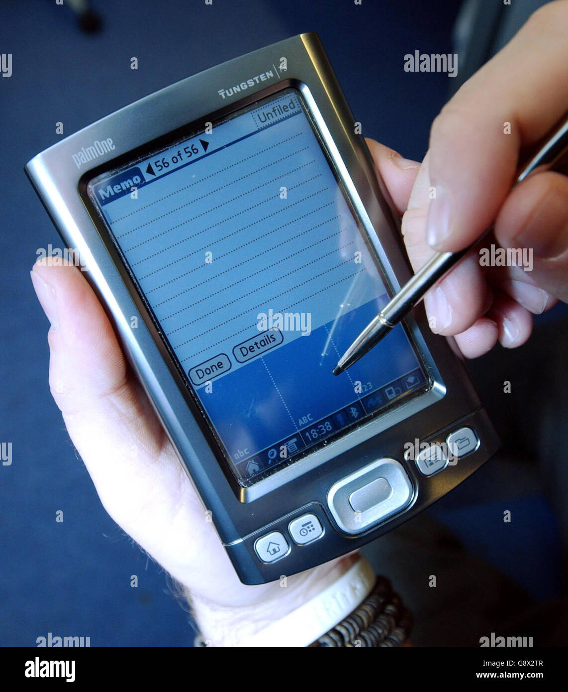 A member of the public uses a Palm Handheld PDA computer. Palmtop computers could change the way healthcare is delivered in the future, an expert said Friday September 30, 2005. Dr Daniel Baumgart, from Humboldt University in Berlin, believes personal digital assistants (PDAs) could be used for teaching medical students, physical training, clinical practice and research. See PA Story HEALTH Palm. PRESS ASSOCIATION Photo. Photo credit should read: Scott Montgomery/PA Stock Photo